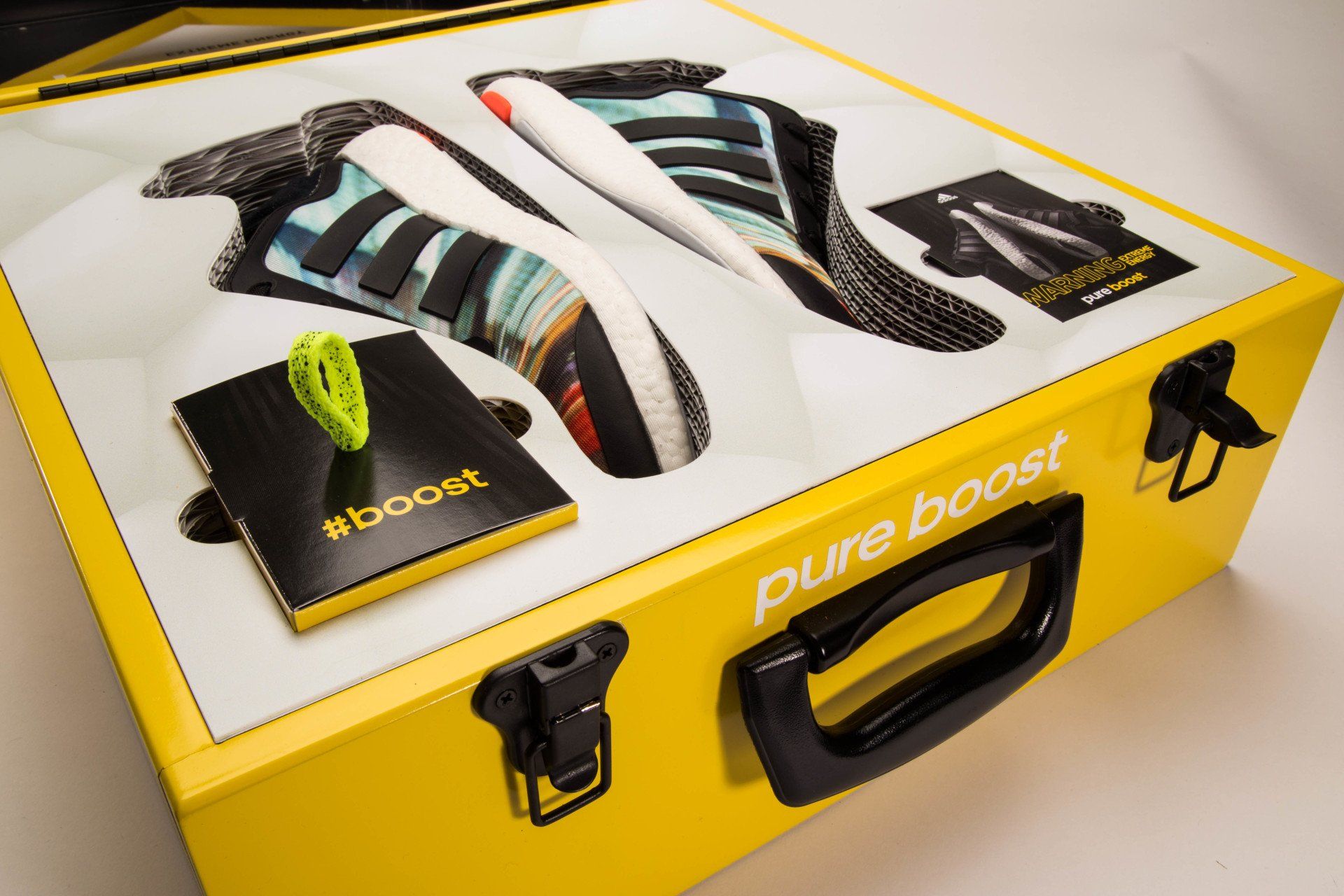 A yellow box that says pure boost on it