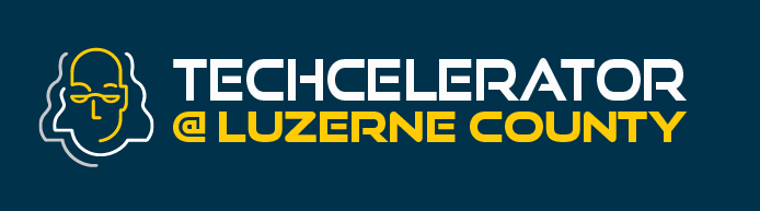 A blue logo for techcelerator @ luzerne county