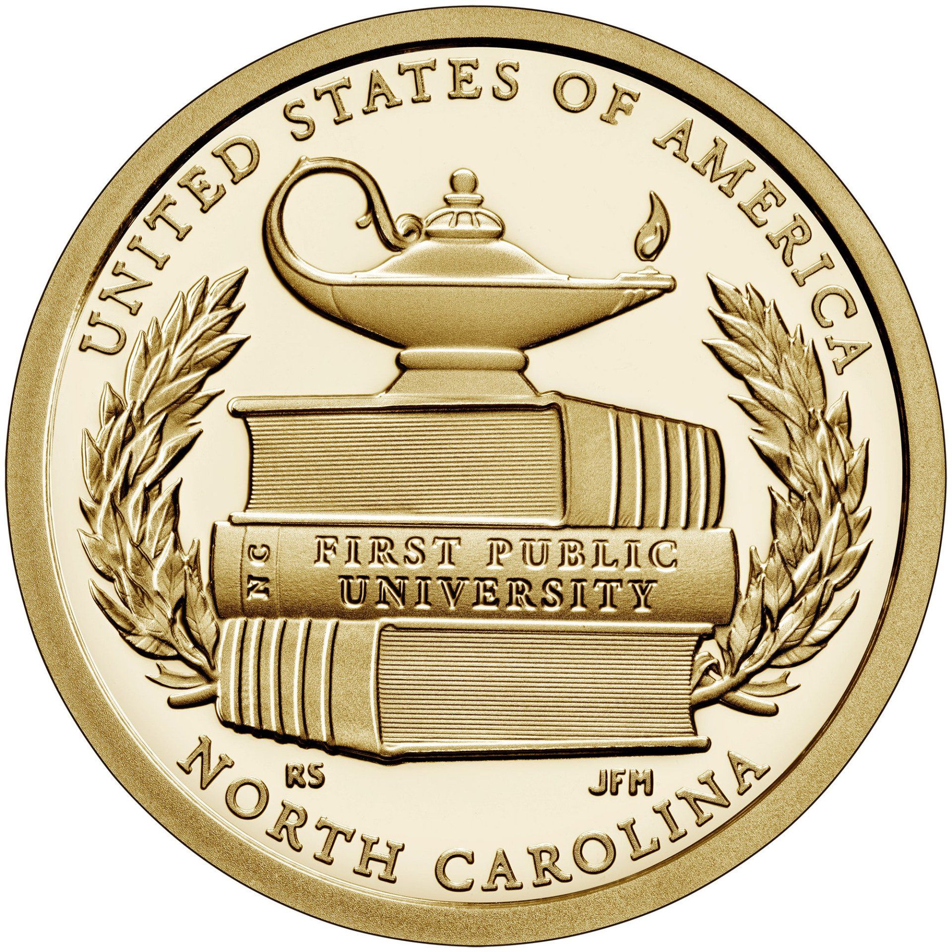 Reverse of the 2021 North Carolina American Innovation $1 Coin shows a stack of three textbooks with “FIRST PUBLIC UNIVERSITY” on the spine of the middle book. A lamp of knowledge is perched atop the books and olive branches curve around the edge of the design.  United States Mint Image