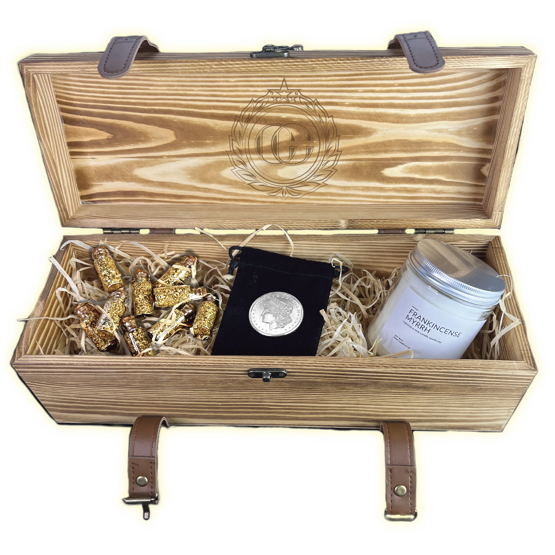 Carpenter gift box open, with Gold Flakes, A Morgan Dollar, and Frankincense and Myrrh Candle.
