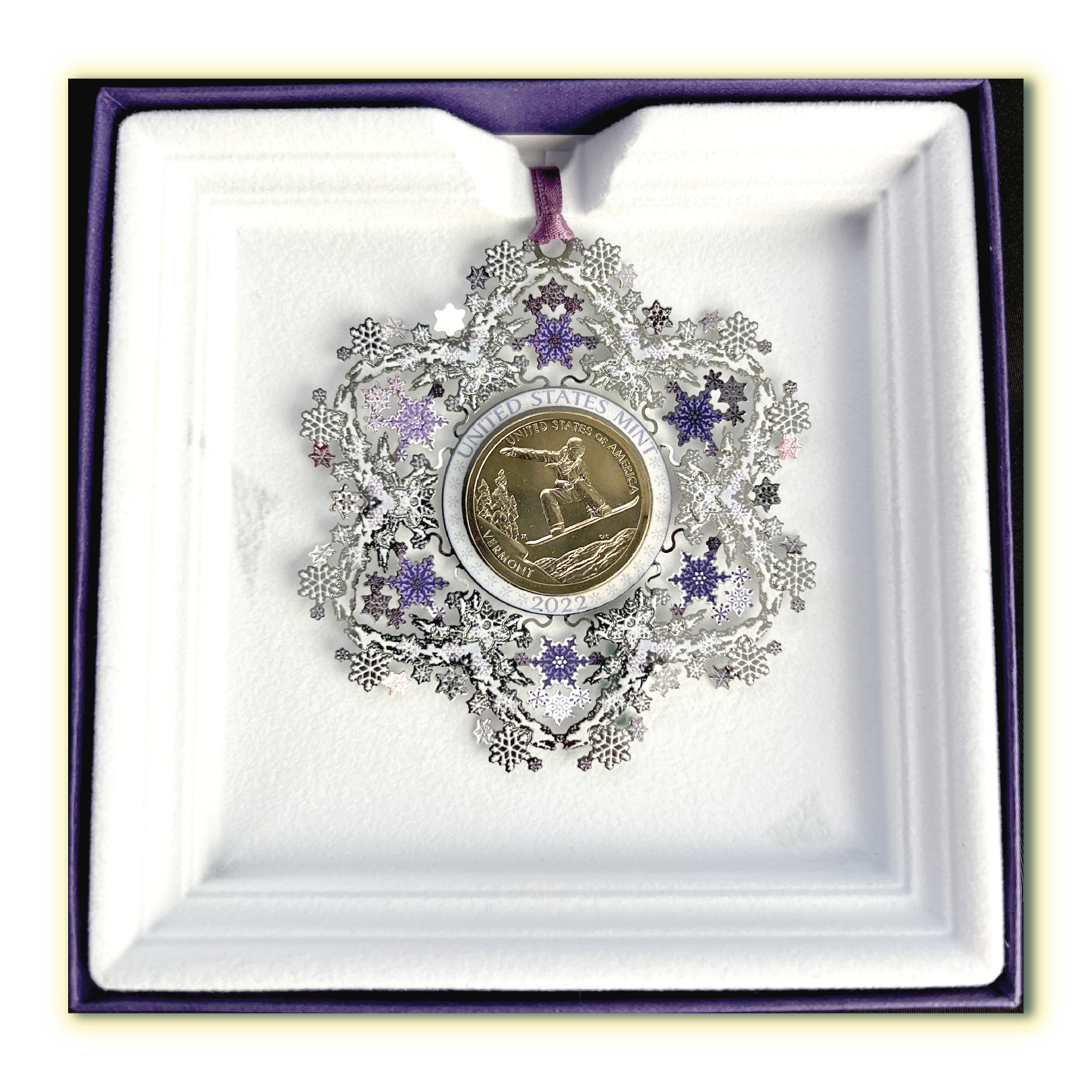 Close up of United States Mint 2022 Ornament featuring the American Innovation $1 Coin for Vermont