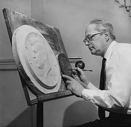 Roberts working on the design of the Kennedy Kennedy Half Dollar