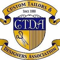 The logo for the custom tailors and designers association.