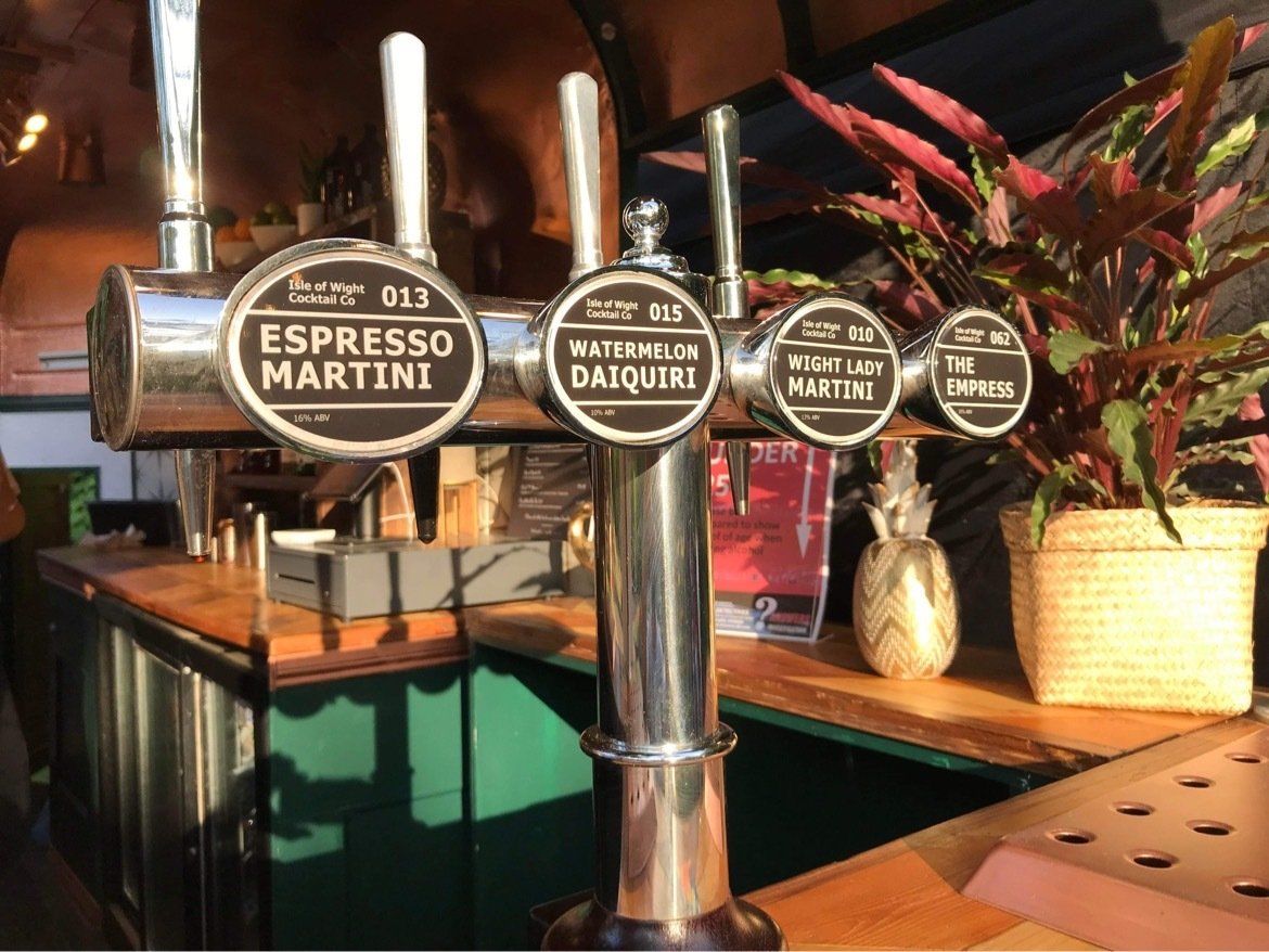A bar with a beer tap that says espresso martini on it.
