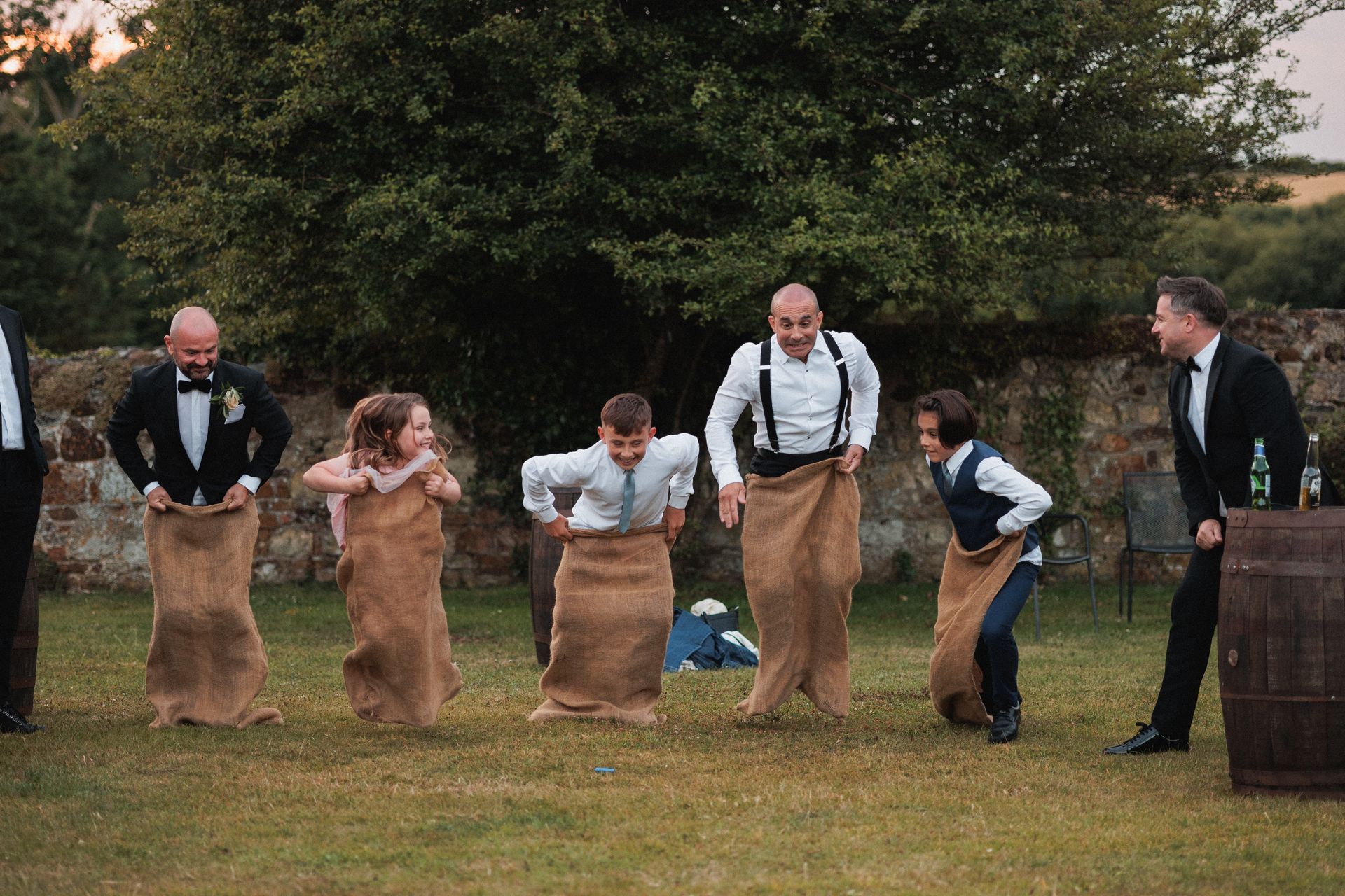 A group of people are playing a game in a field.