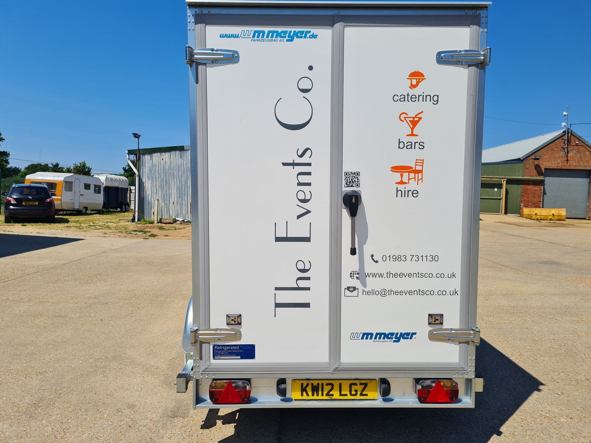 The back of a trailer that says the events co.