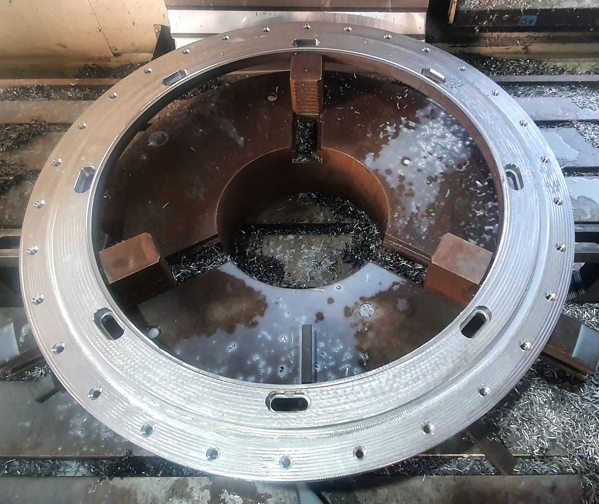 A metal ring is sitting on top of a machine