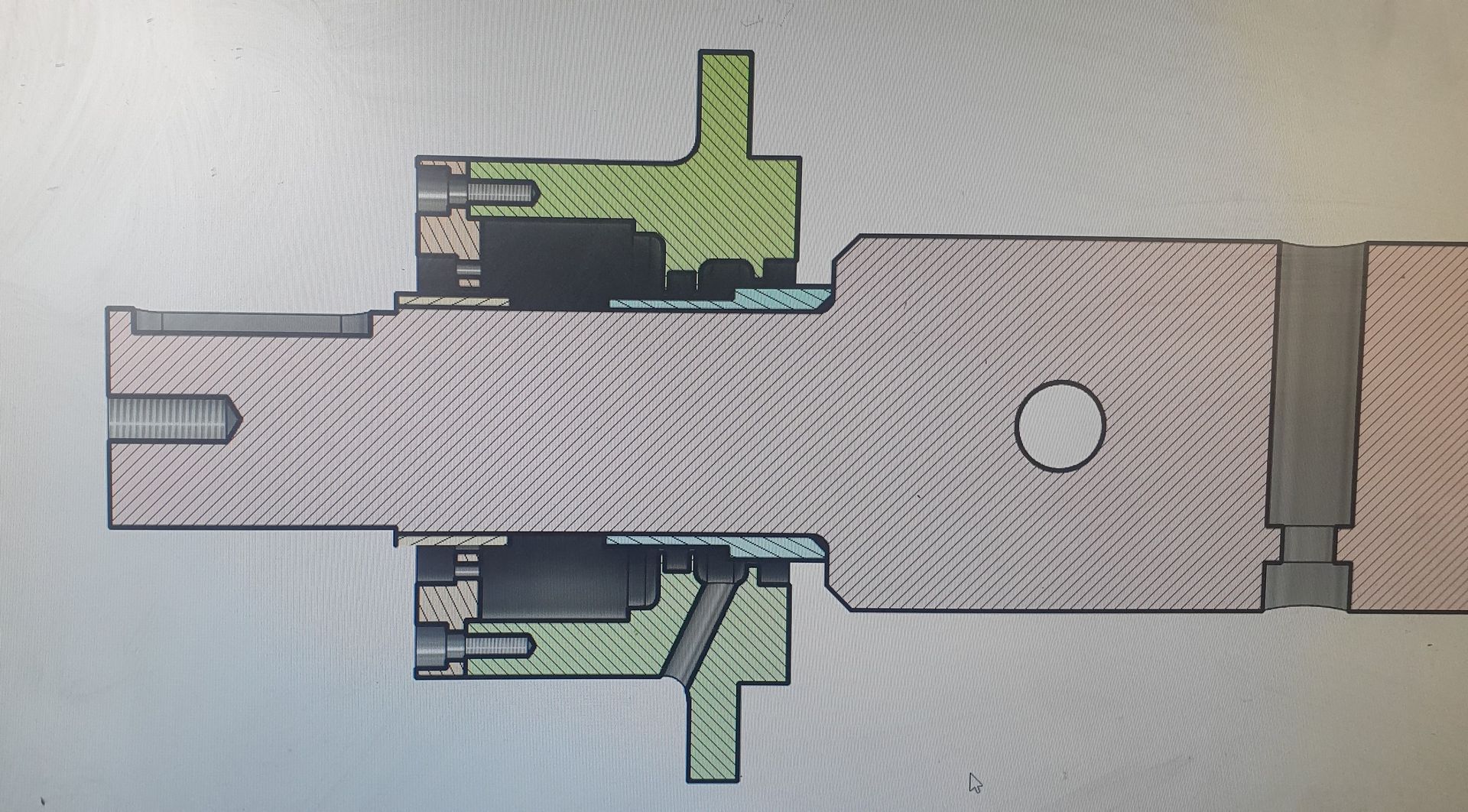 A drawing of a machine with a circle in the middle.