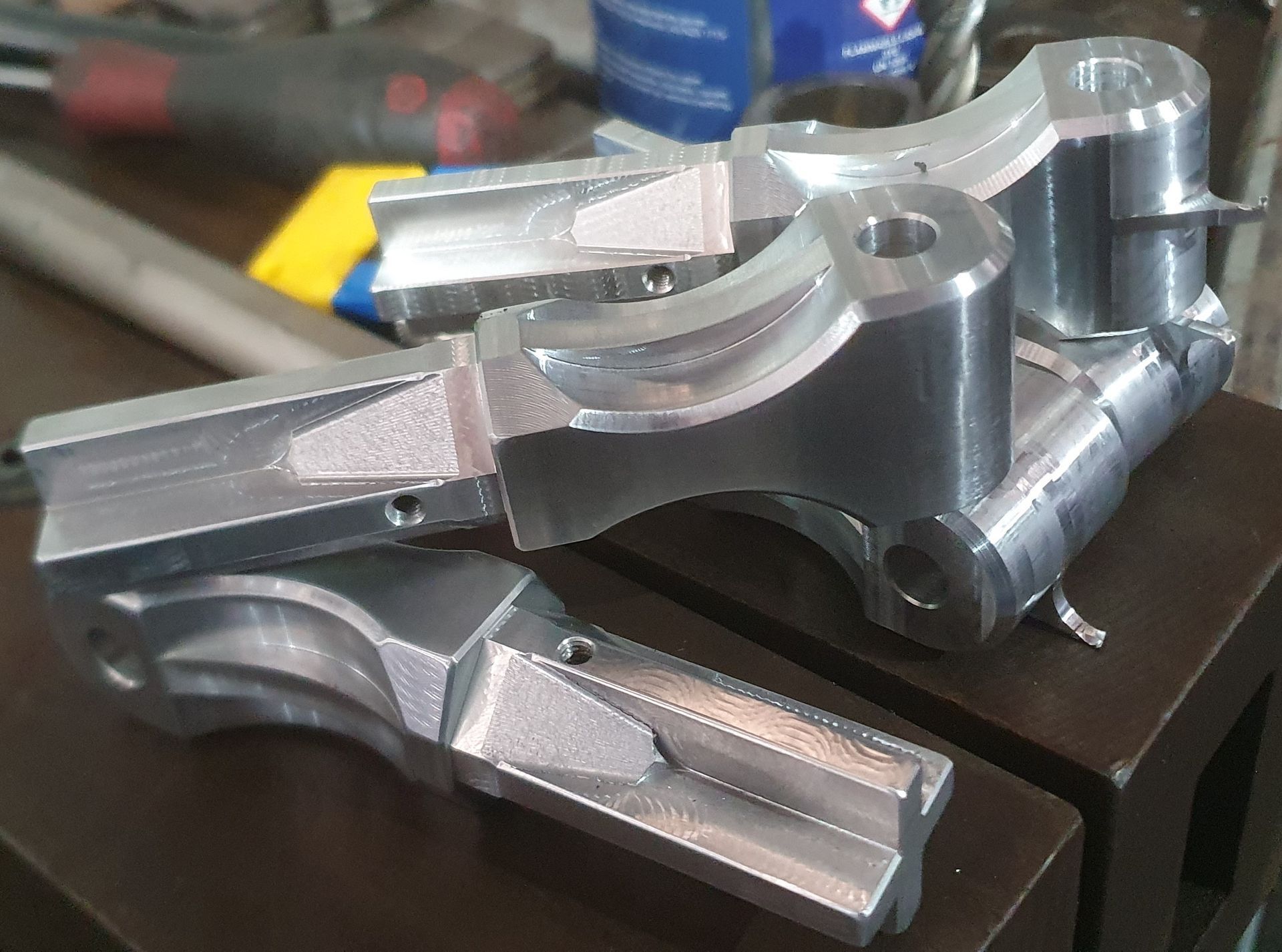 A couple of metal pieces sitting on top of a table