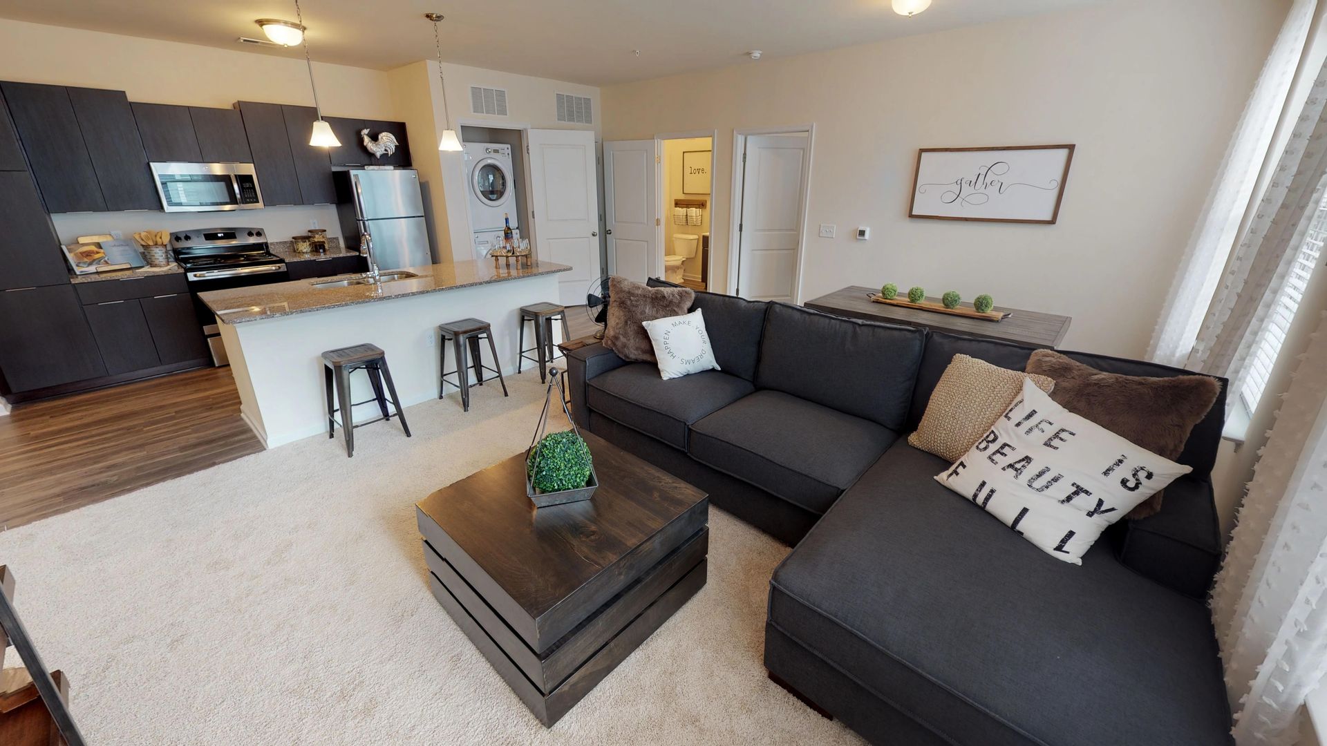 A living room with a couch and a coffee table