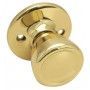 A close up of a brass door knob on a white background.