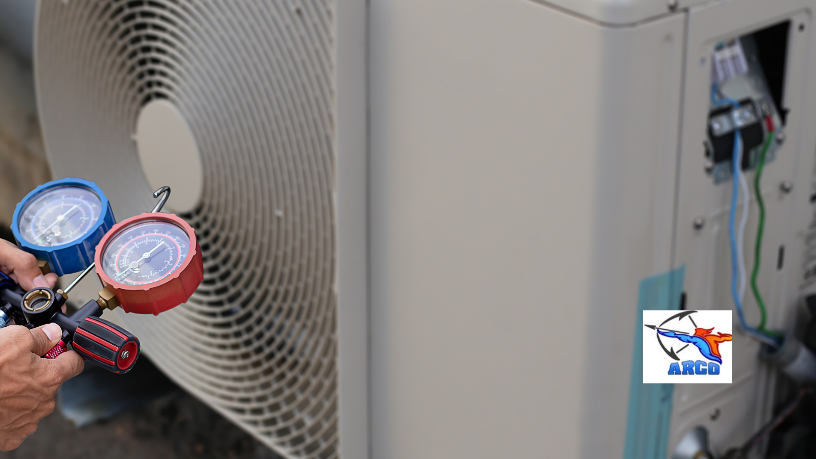 Hands connecting colored wires inside an electrical panel, with a fan grill in the background.