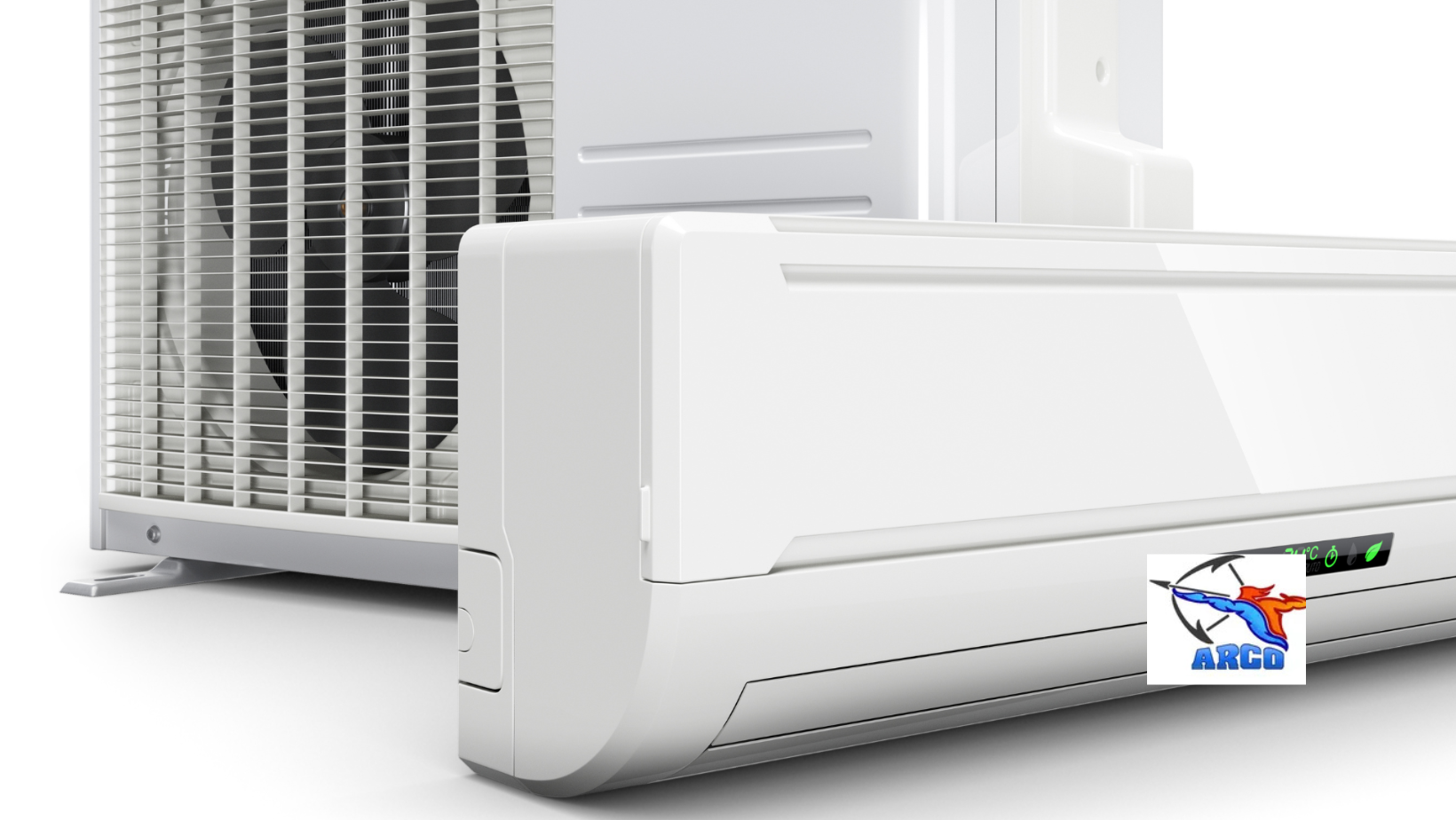 White air conditioner indoor and outdoor units on a plain background