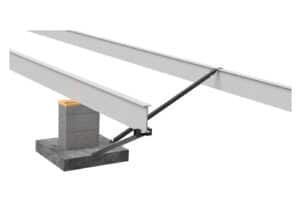 A metal beam is sitting on top of a concrete block.