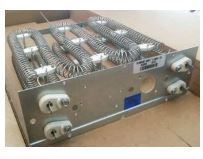 A heater is sitting on top of a cardboard box on a table.