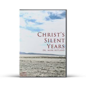 Book cover of "Christ's Silent Years" by Dr. Mark Rutland, a landscape with cloudy sky and barren foreground.