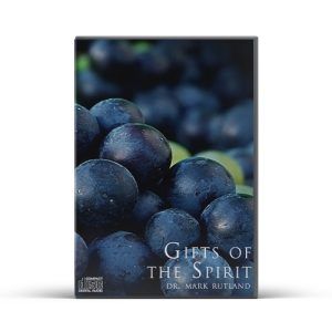 Book cover titled "Gifts of the Spirit" by Dr. Mark Rutland.  Features close-up of dark blue grapes.