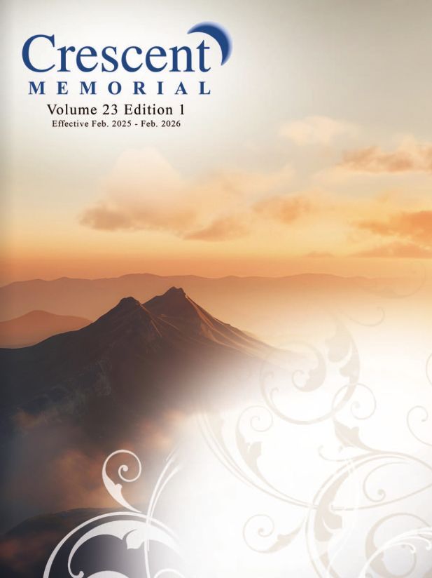 The cover of crescent memorial volume 23 edition 1 shows a mountain range in the mist at sunrise