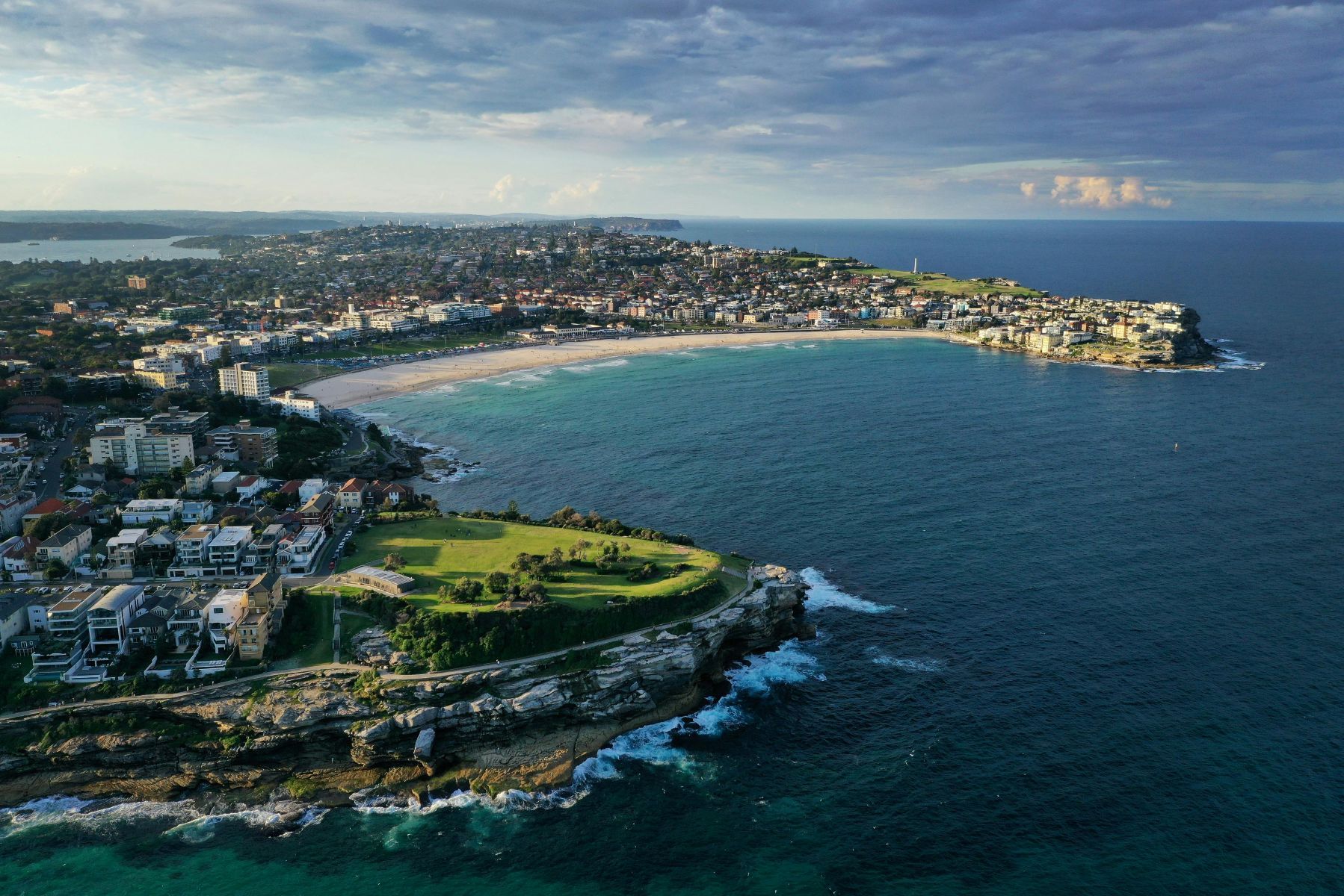 Aerial photo of NSW city beside coast.