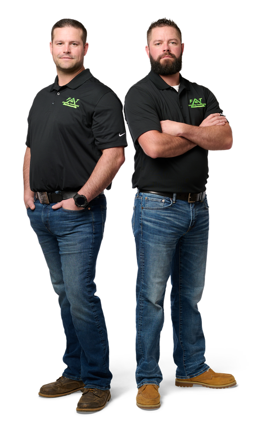 Keith and Kyle of F&T Landscaping standing next to each other with their arms crossed.