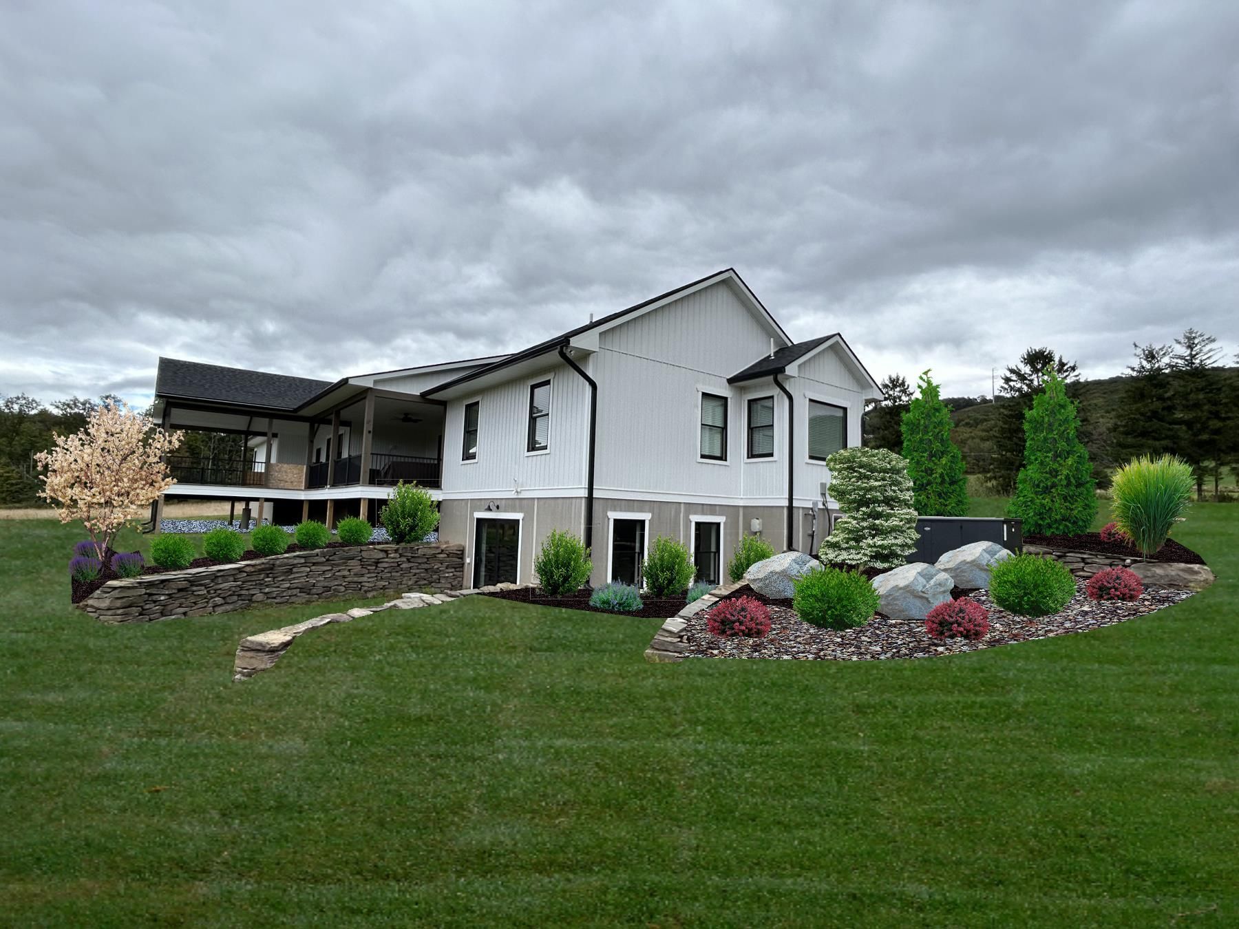 A beautiful new full yard installed with shrubs, flowering plants, mulch and driveway.