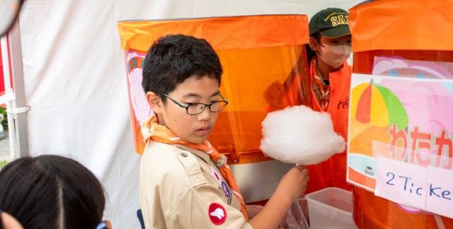 Boy Scouts making cotton candy