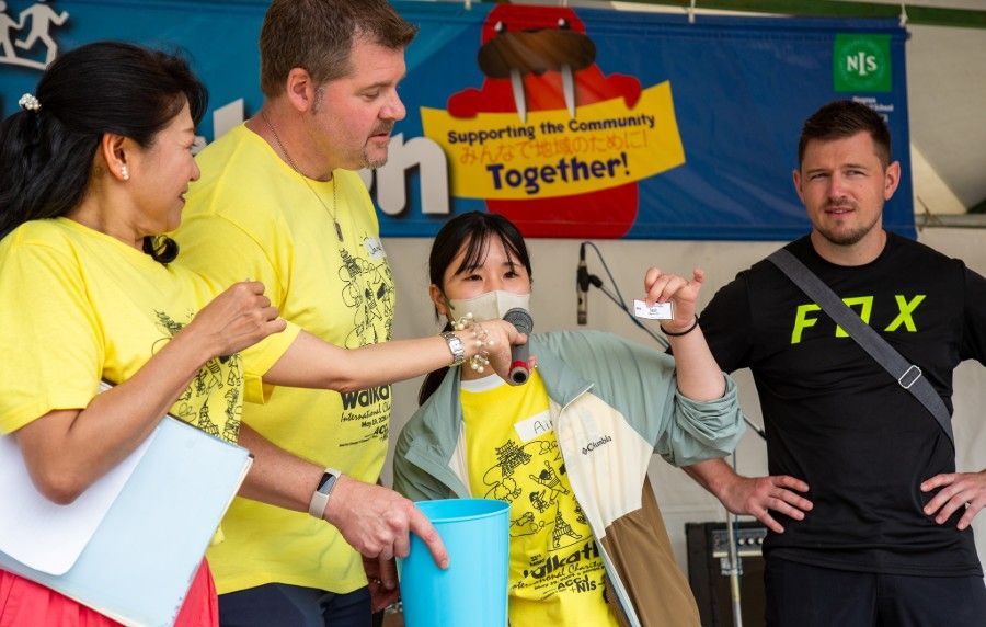 James Hedden on stage at Chubu Walkathon