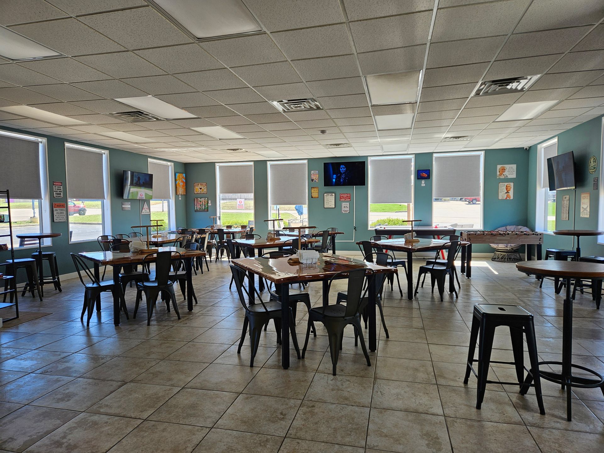 dining area with tables and games