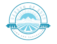 Logo for "Garden of Eden" lawn and landscape, blue and white, featuring mountains and fields with sunburst.