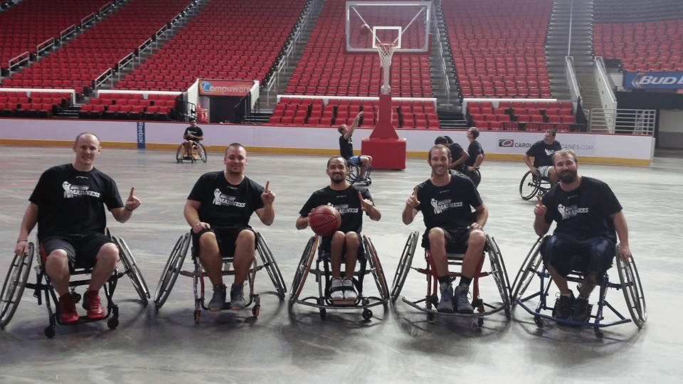 tim member of core group brit roberts playing in aug madness bball tourn to benefit bridgeiisports.png