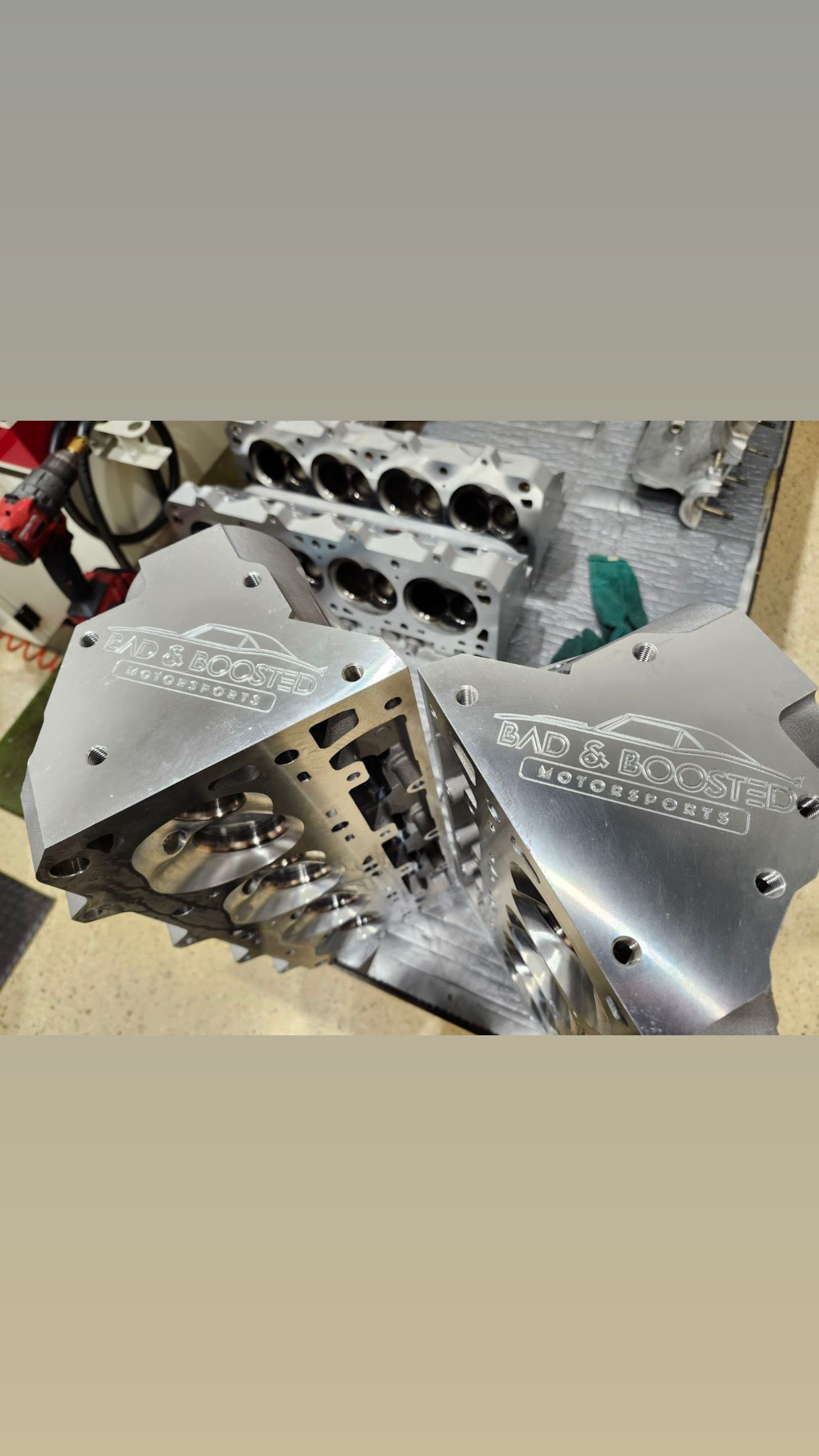 A bunch of metal pieces are sitting on top of each other on a table.