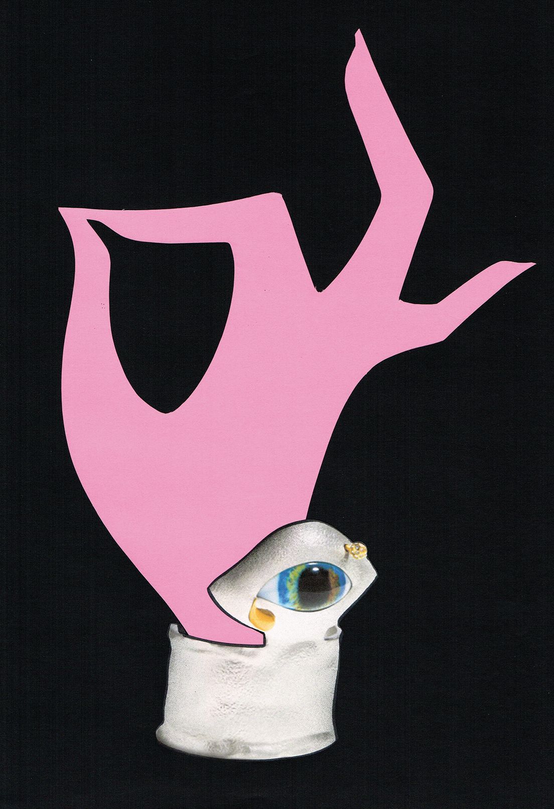 Pink hand holding a stylized eye ring on a silver base, against a black background.