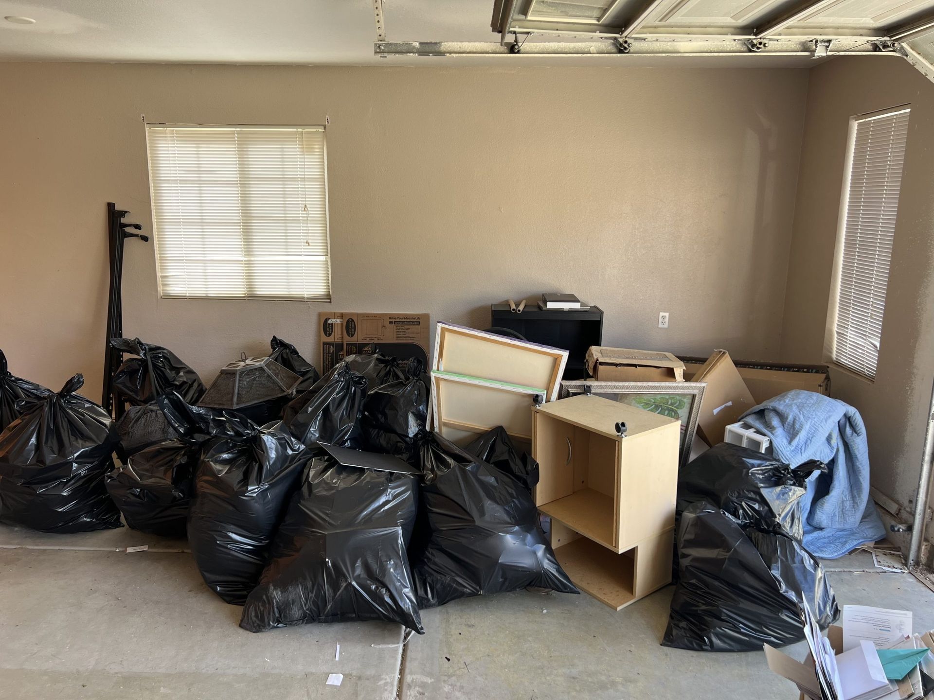 A construction worker is working on a concrete wall.