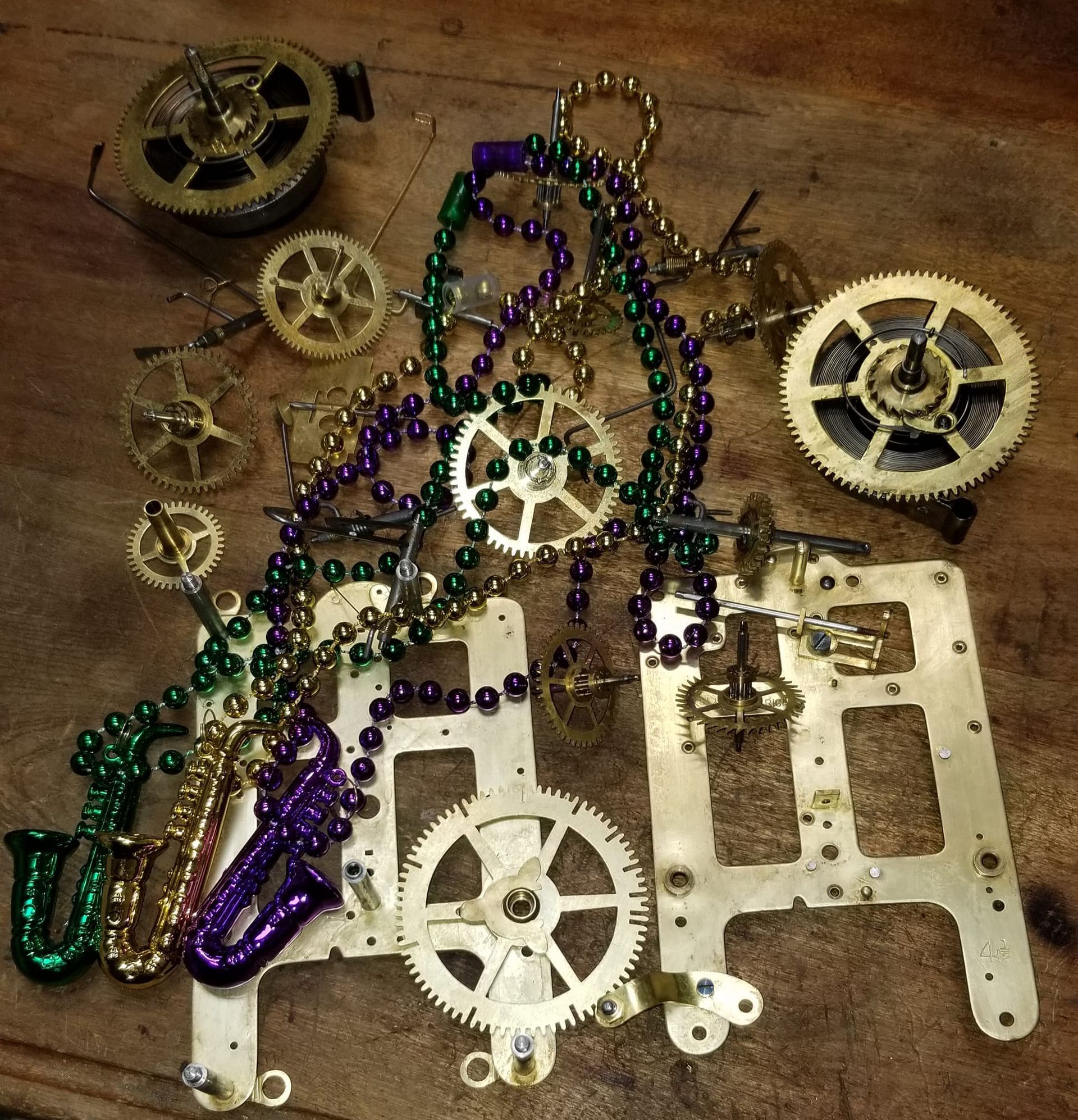 A bunch of gears and beads on a table