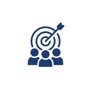 A group of people are standing around a target with an arrow in it.