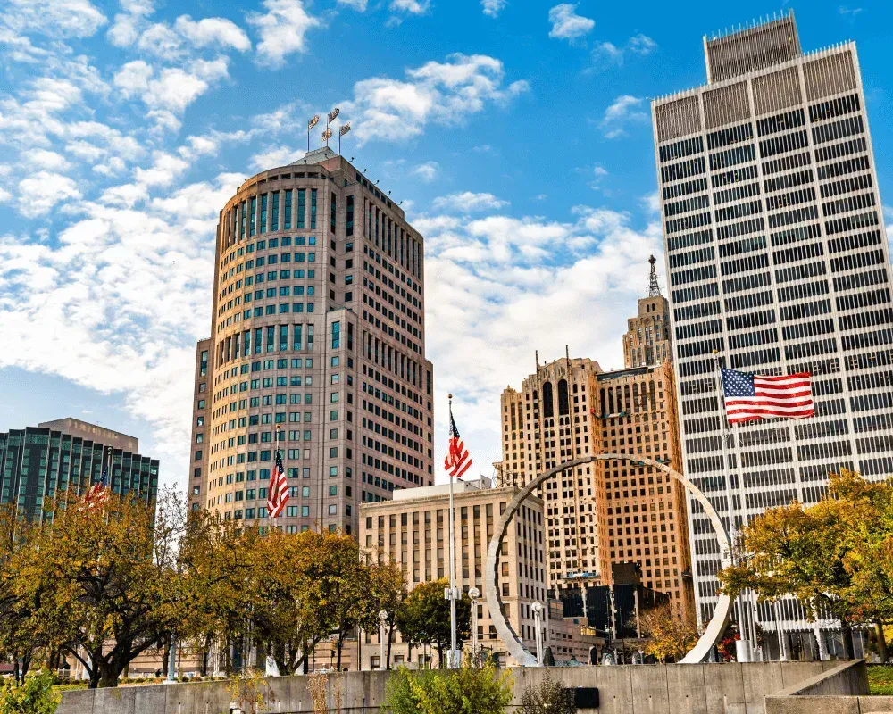 A city skyline with a ferris wheel in the middle of the city.