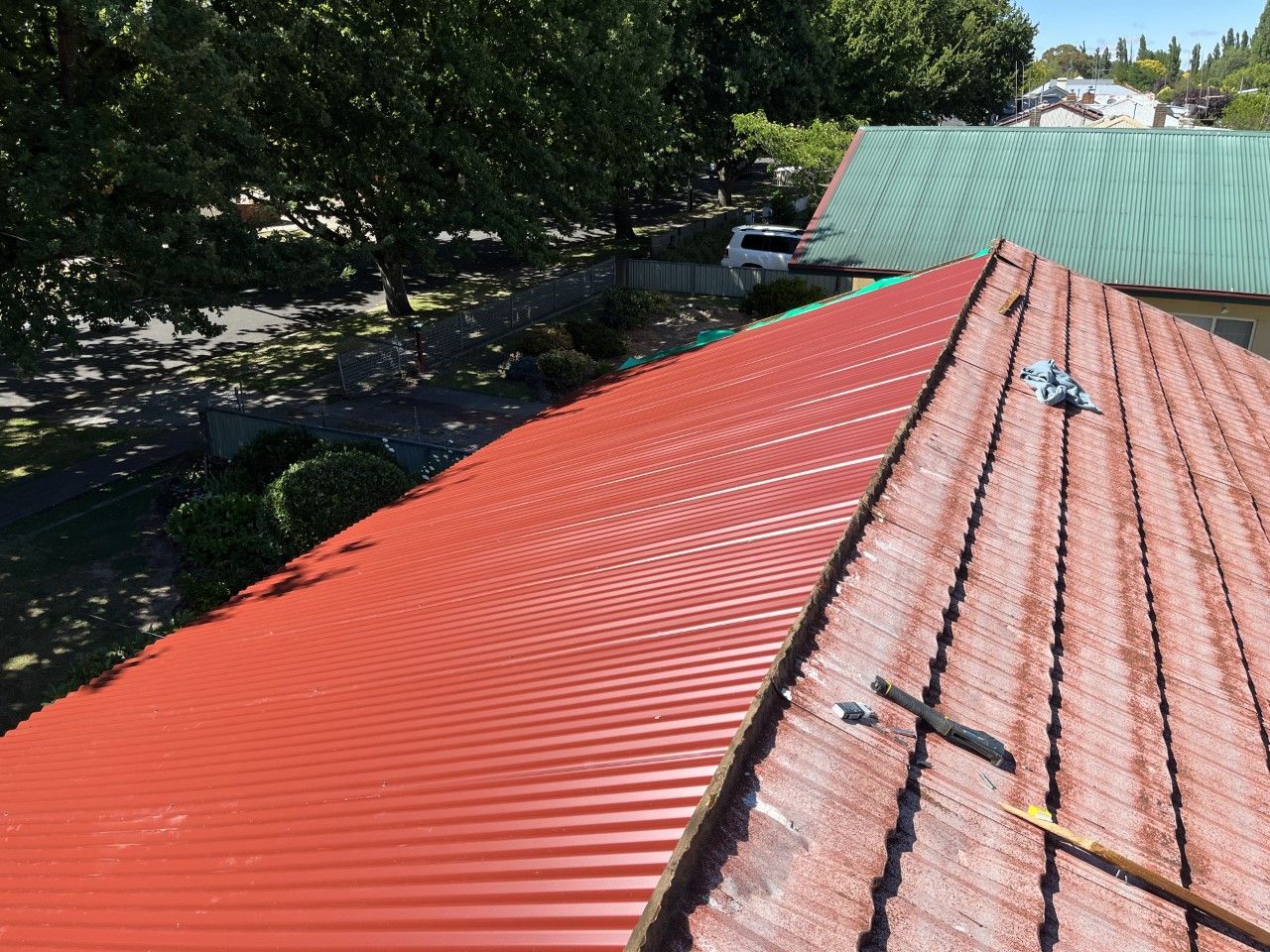 Metal Drill Used to Attached Metal Roof Sheet — Roofer in Forbes, NSW