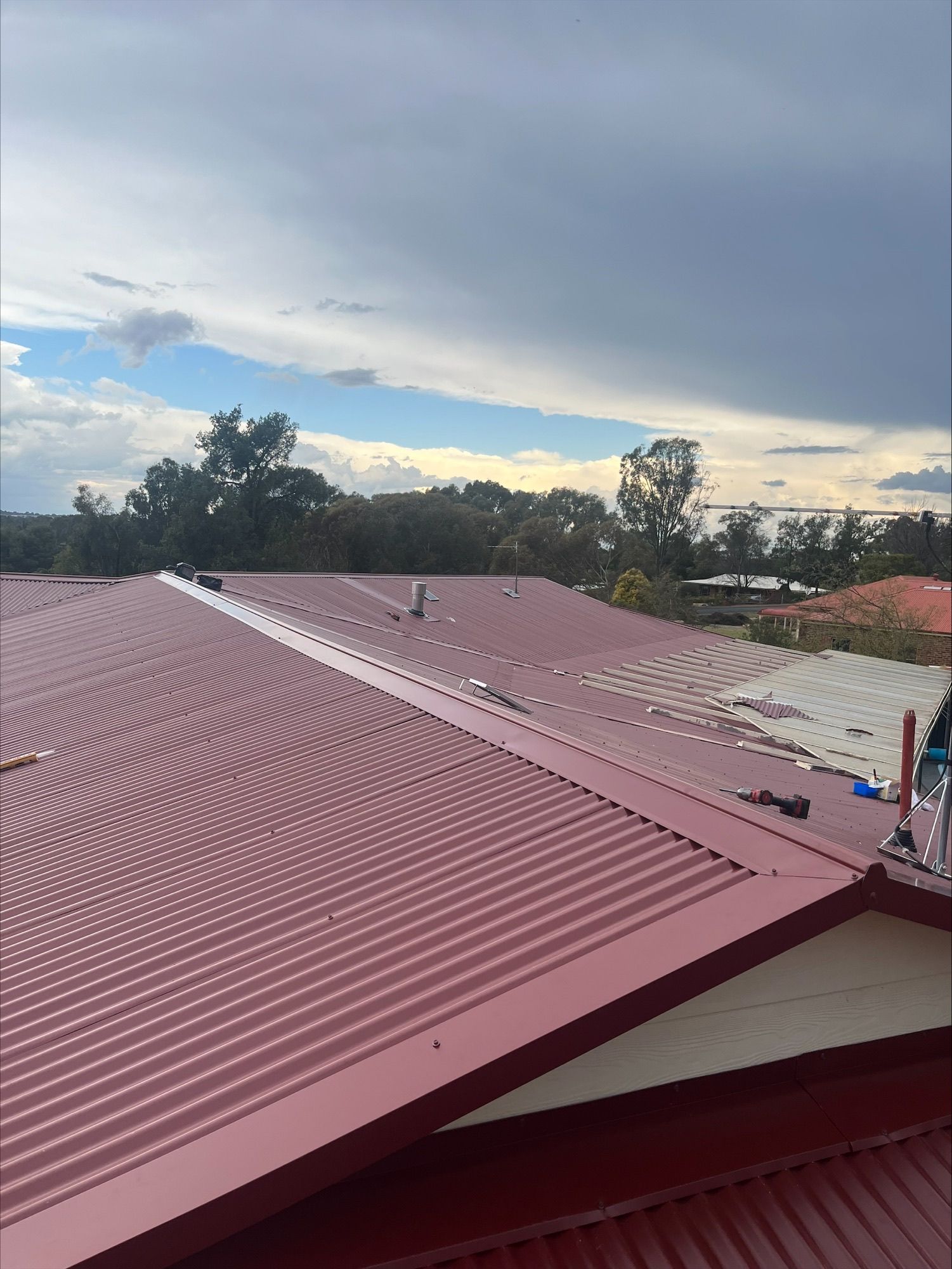 dark red Roofing — Roofer in Orange, NSW
