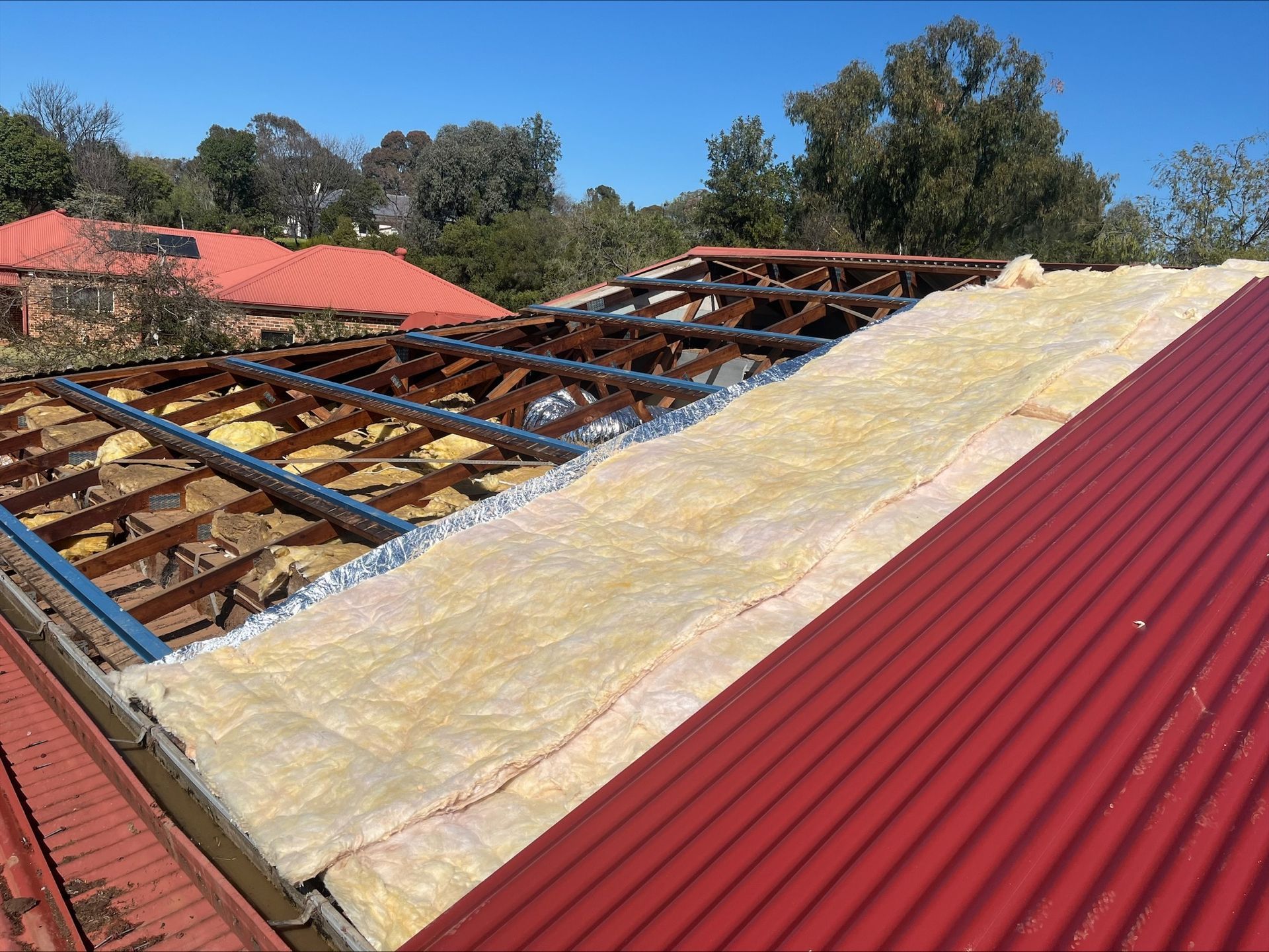 Roof in the middle of being repaired — Roofer in Forbes, NSW