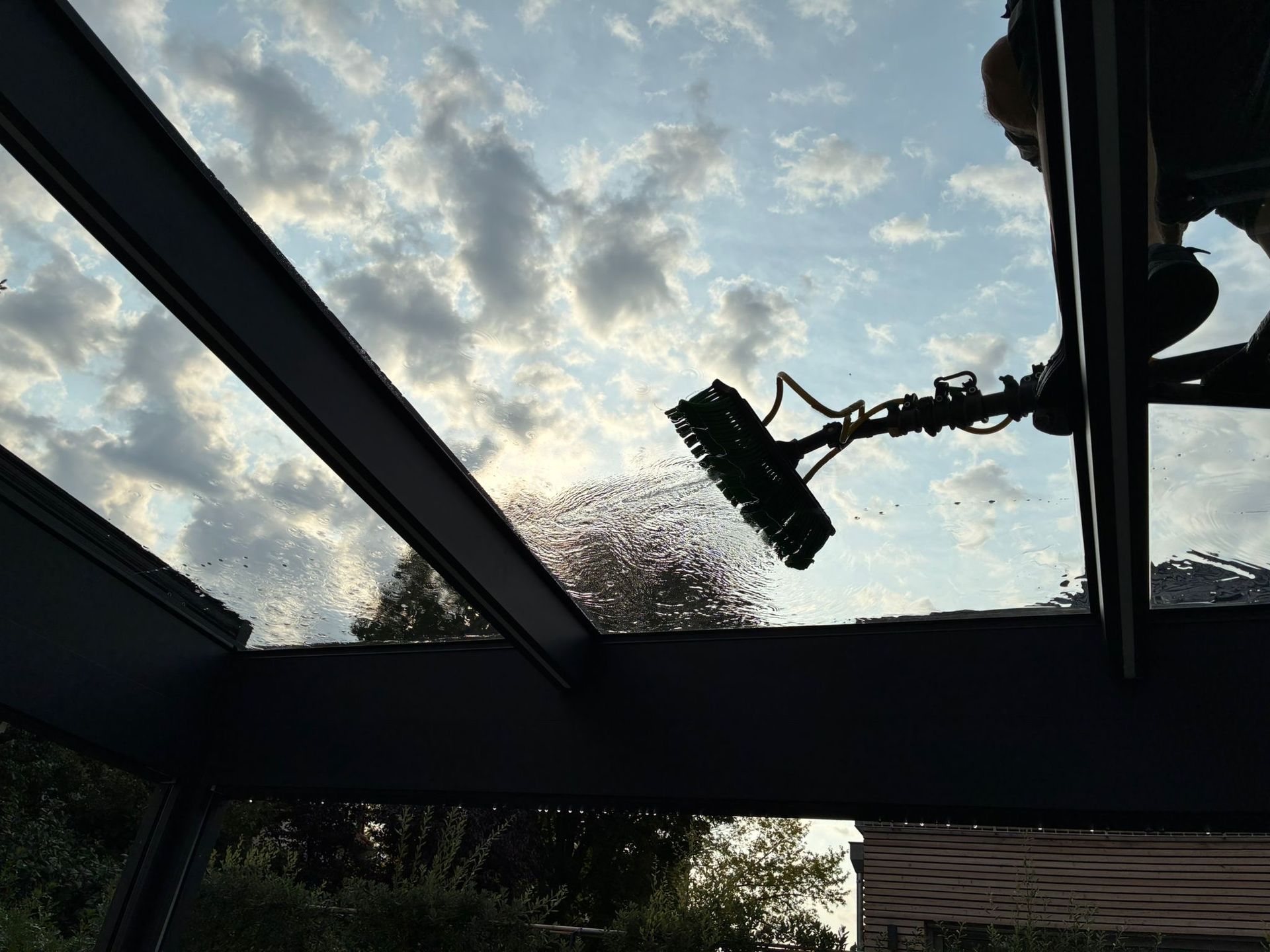 Glasreinigung mit Osmosegerät