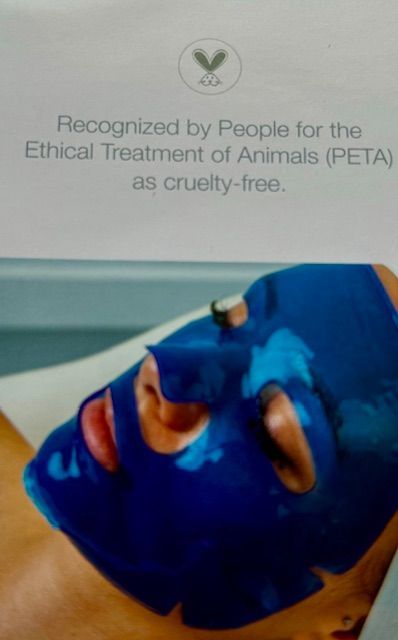 A person with a blue mask on their face is recognized by people for the ethical treatment of animals