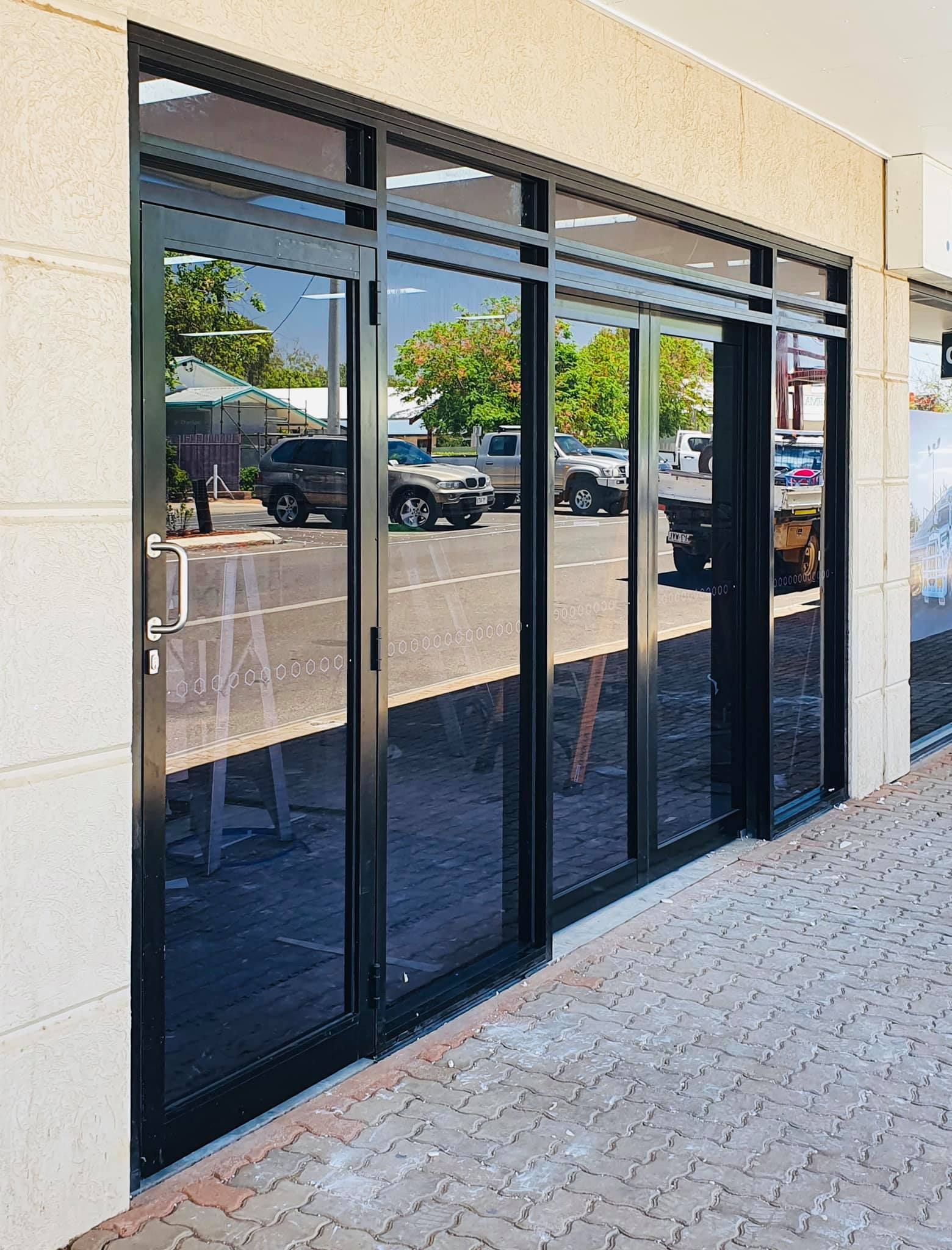Glass installation in shop front— Innisfail Glass & Aluminium In Tully, QLD