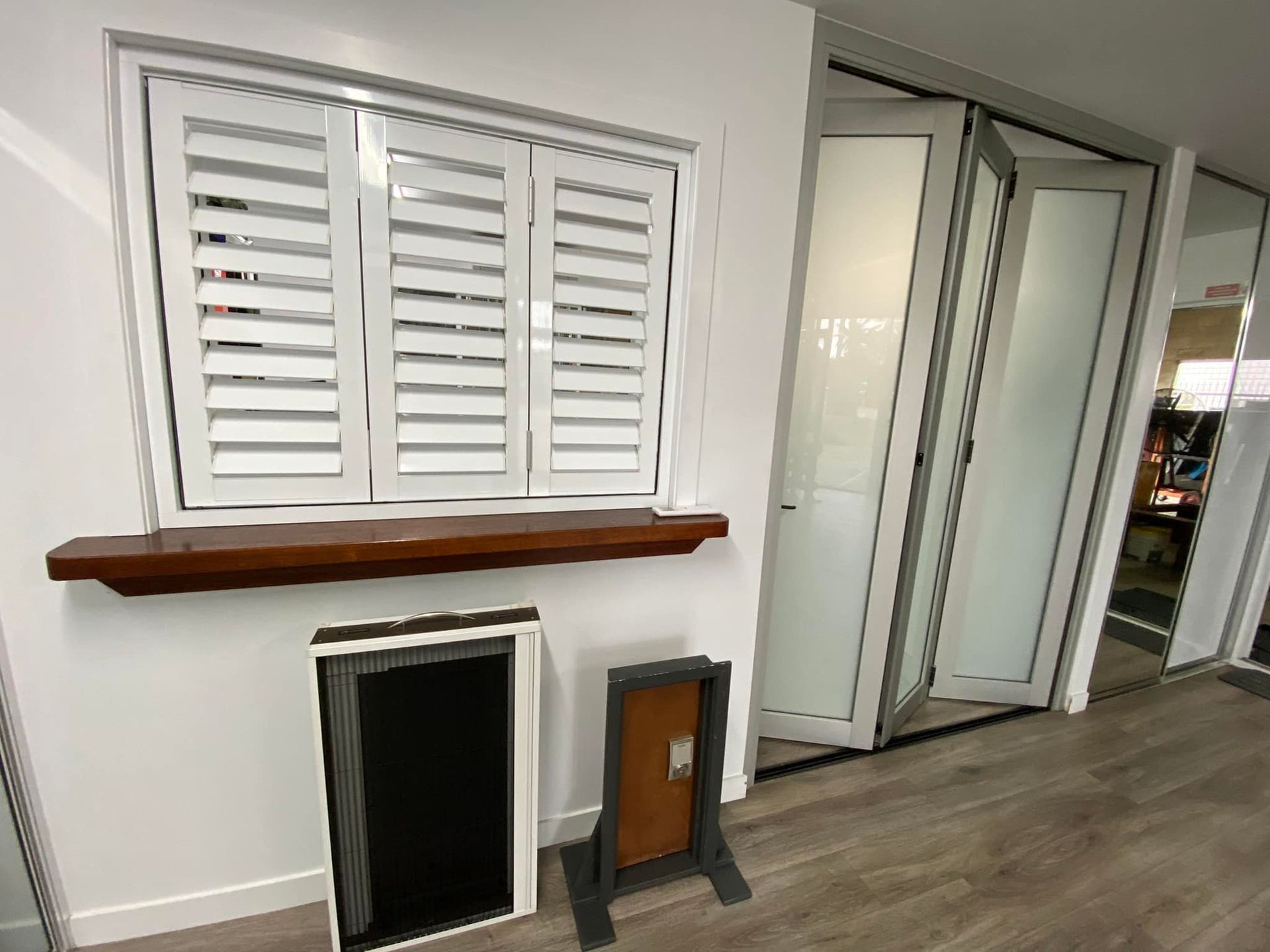 Window Shutters on display in our showroom — Innisfail Glass & Aluminium In Mission Beach, QLD