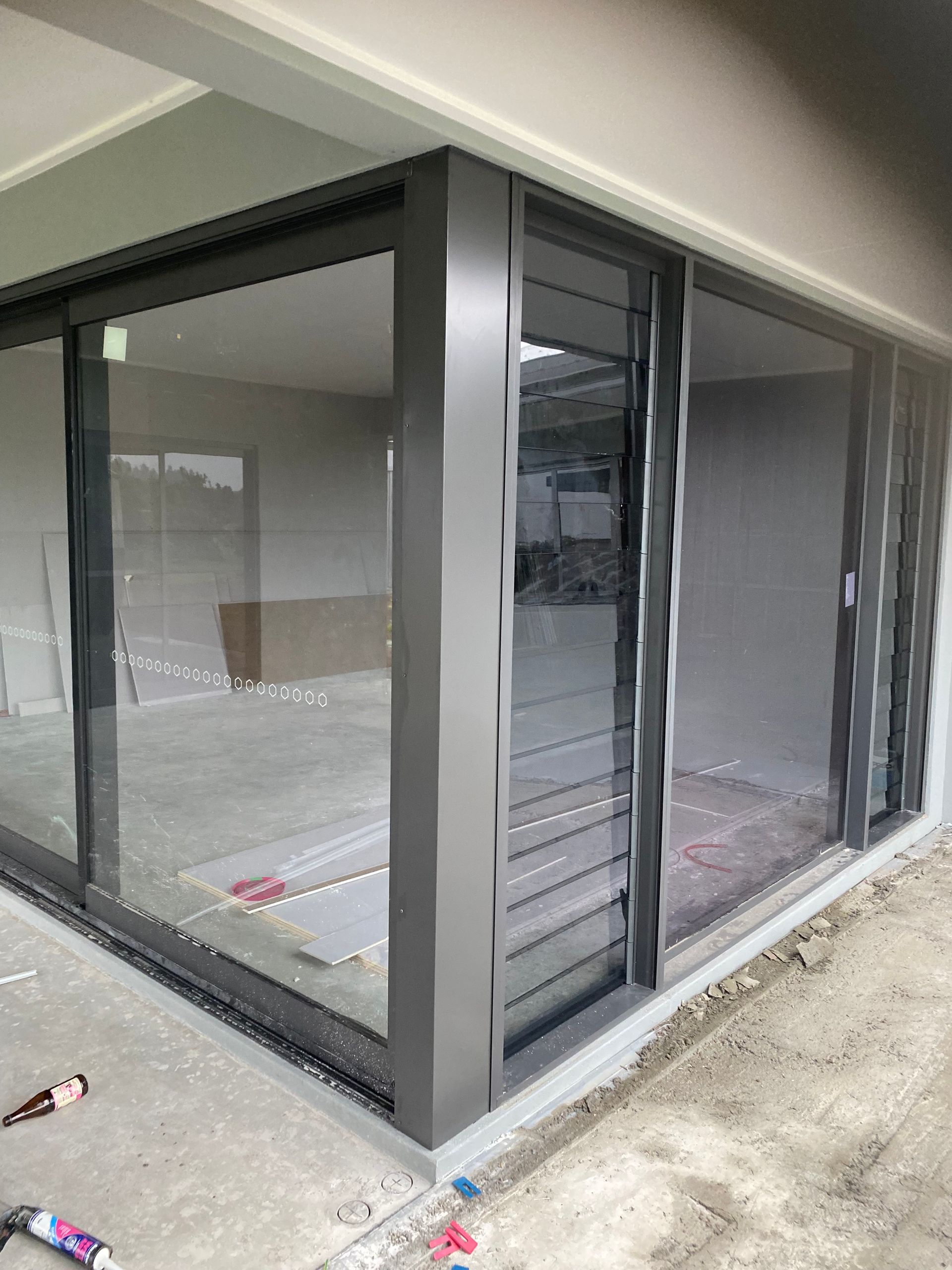 A room with a lot of windows and a sliding glass door — Innisfail Glass & Aluminium In Innisfail, QLD