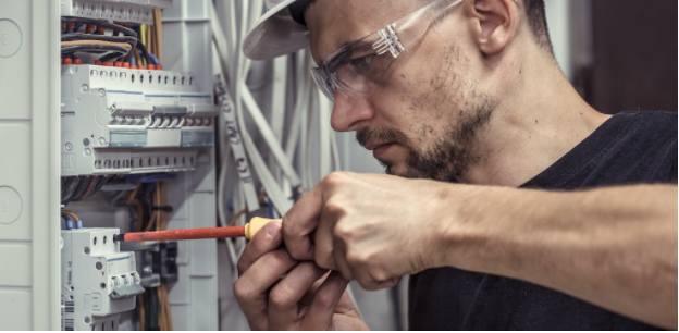 electrician repairing electric wirings