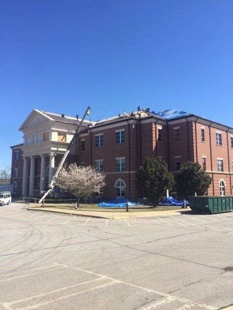 Workers repairing the roof — Atlanta, GA — Atlantic Restoration Services