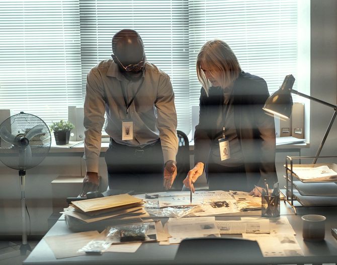 Investigators checking the documents