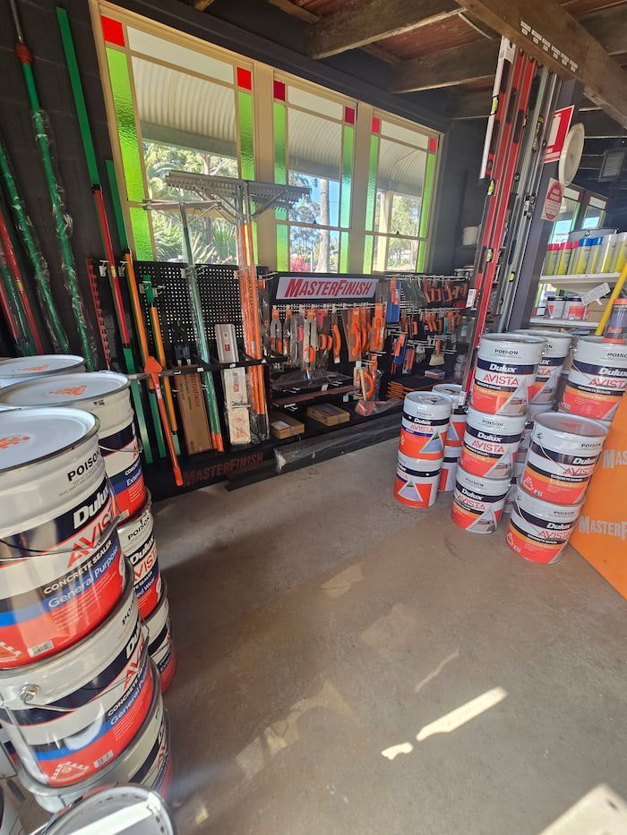 A Room Filled with Buckets of Paint and Tools — BVN Landscape & Steel Supplies in St Georges Basin, NSW