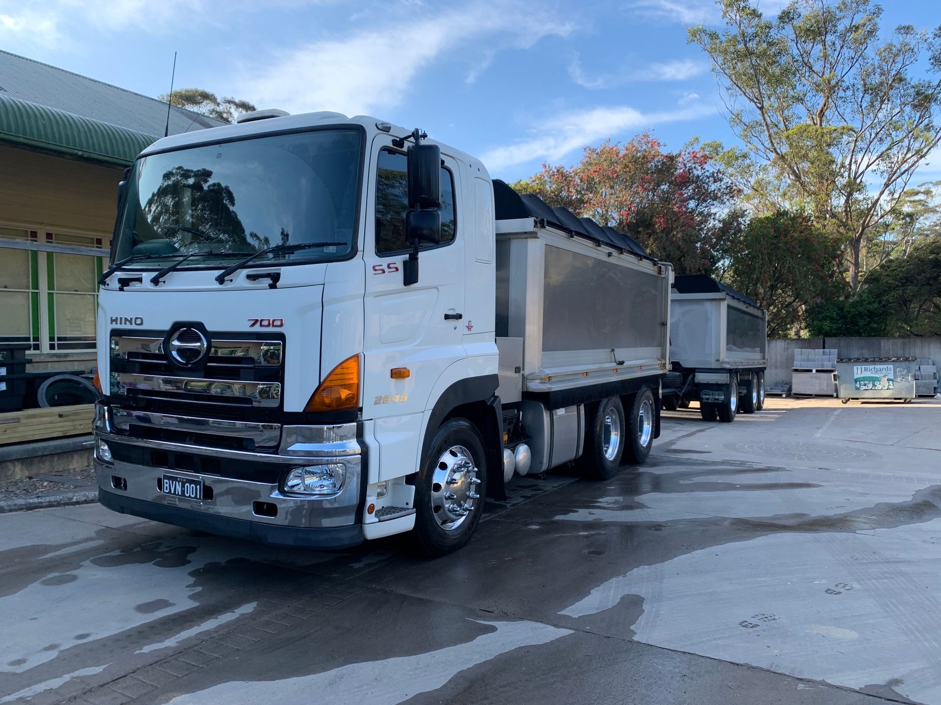 White Hino Truck With a Trailer, Parked Outdoors — BVN Landscape & Steel Supplies in St Georges Basin, NSW