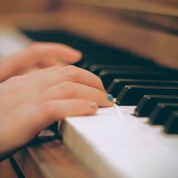 Child playing piano